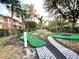 A fun putting green is a great way to enjoy Florida living at 2788 Sun Key Pl, Kissimmee, FL 34747