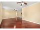 Large bedroom with hardwood floors and neutral paint at 2841 S Lloyd Ln, Kissimmee, FL 34744
