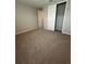 Bedroom featuring carpet and a closet at 2920 Agostino Ter, Kissimmee, FL 34746