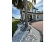 Elegant home with columned front porch, brick driveway and landscaped yard at 2920 Agostino Ter, Kissimmee, FL 34746