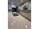 Kitchen features a large island with a stainless steel sink and light countertops at 2920 Agostino Ter, Kissimmee, FL 34746