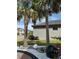 Landscaping with gravel, rocks, tropical plants, and decorative water feature enhance the curb appeal at 2920 Agostino Ter, Kissimmee, FL 34746