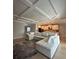 Open-concept living room, flows into the kitchen, with large sectional sofa at 2920 Agostino Ter, Kissimmee, FL 34746