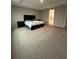 Carpeted primary bedroom with ensuite bathroom at 2920 Agostino Ter, Kissimmee, FL 34746