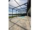 Enjoy privacy and relaxation in this screened-in pool area, set against a backdrop of lush greenery and pond views at 2920 Agostino Ter, Kissimmee, FL 34746