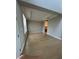 Spacious room featuring hardwood floors, neutral walls, with open access, ready for custom design at 2920 Agostino Ter, Kissimmee, FL 34746