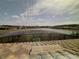 Beautiful view of the community lake from inside the screened lanai at 2920 Agostino Ter, Kissimmee, FL 34746