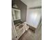Bathroom showcasing a tub-shower combination with white shower curtain, complemented by neutral tones and a white vanity at 31 S Edgemon Ave, Winter Springs, FL 32708