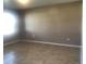 Tile-floored bedroom featuring neutral walls, baseboards and window at 3102 Westbrook Rd, Kissimmee, FL 34746