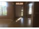 Tiled entryway featuring natural light and a white front door at 3102 Westbrook Rd, Kissimmee, FL 34746