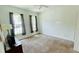 Spacious bedroom with carpet flooring, ample natural light from windows and closet at 349 Captiva Dr, Davenport, FL 33896