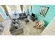 Comfortable living room features stylish decor, a view of the pool, and tile flooring at 349 Captiva Dr, Davenport, FL 33896