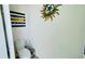 Clean, bright bathroom with toilet, decorative whale and sun decor adding a touch of charm at 349 Captiva Dr, Davenport, FL 33896