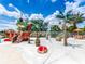 Fun-filled waterpark featuring a pirate ship, water features, and shaded seating areas for families at 349 Captiva Dr, Davenport, FL 33896