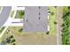 Aerial view of the roof showing the driveway, plantings and backyard at 3617 Anibal St, Kissimmee, FL 34746