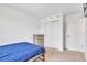 A minimalist bedroom design with white walls and practical closet at 3617 Anibal St, Kissimmee, FL 34746