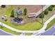 Aerial view of the community sign among lush greenery and landscaping at 3617 Anibal St, Kissimmee, FL 34746
