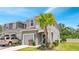 Charming two-story home with landscaped yard and an attached garage at 3617 Anibal St, Kissimmee, FL 34746