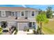 Charming two-story home features a well-manicured lawn, front-entry garage, and cozy porch at 3617 Anibal St, Kissimmee, FL 34746