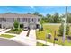 Beautiful townhome features manicured landscaping, driveway, and well-maintained facade at 3617 Anibal St, Kissimmee, FL 34746