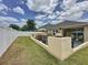 Spacious backyard, featuring outdoor kitchen, patio and bar area at 3690 Maidencain St, Clermont, FL 34714