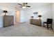 Inviting bedroom with neutral carpet, ceiling fan, and two matching dressers at 3690 Maidencain St, Clermont, FL 34714