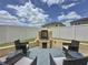 Relax on the patio and enjoy the firepit at 3690 Maidencain St, Clermont, FL 34714