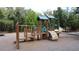 Community playground with climbing structure, slide, and other activities for children at 3690 Maidencain St, Clermont, FL 34714