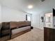 Bedroom features bunk beds, wall art, carpet and view to bathroom at 394 Orange Cosmos Blvd, Davenport, FL 33837