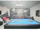 The ultimate game room featuring a pool table, foosball, and a Star Wars mural at 394 Orange Cosmos Blvd, Davenport, FL 33837