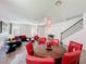 Inviting living space with dining area, comfortable seating, and natural light at 394 Orange Cosmos Blvd, Davenport, FL 33837