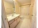 Bathroom with a shower and tub combination at 5451 Vineland Rd # 111, Orlando, FL 32811