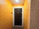 Front door entrance, enhancing security and providing direct access to a well-maintained unit at 5451 Vineland Rd # 111, Orlando, FL 32811