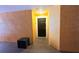 Entrance with front door, providing a private and secure entry point with easy access to the unit at 5451 Vineland Rd # 111, Orlando, FL 32811