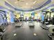 Community gym with treadmills and weight machines for a convenient workout at 5451 Vineland Rd # 111, Orlando, FL 32811