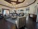 Relaxing clubhouse area with comfortable sofas and an elegant open floorplan at 5451 Vineland Rd # 111, Orlando, FL 32811
