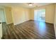 The large living room leads to a screened porch with sliding glass doors at 5451 Vineland Rd # 111, Orlando, FL 32811