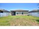 Spacious backyard with a privacy fence and screened in patio at 5816 Beefmaster Rd, St Cloud, FL 34771