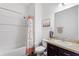 Bathroom with a shower, toilet, and single sink with a mirror at 5816 Beefmaster Rd, St Cloud, FL 34771