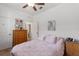 Bedroom featuring a ceiling fan, and a view of the bathroom at 5816 Beefmaster Rd, St Cloud, FL 34771