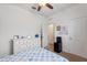 Bedroom featuring a dresser and an adjoining bathroom at 5816 Beefmaster Rd, St Cloud, FL 34771
