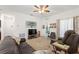 Spacious living room featuring neutral color palette and comfortable seating at 5816 Beefmaster Rd, St Cloud, FL 34771