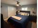 Bedroom featuring a full sized bed, ceiling fan, and large closet at 585 Mourning Dove Cir, Lake Mary, FL 32746