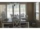 Dining room features a table, chairs and natural light coming in from the windows at 585 Mourning Dove Cir, Lake Mary, FL 32746