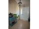 Welcoming foyer featuring tile flooring and stylish decor at 585 Mourning Dove Cir, Lake Mary, FL 32746