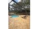 Relaxing screened in pool with lounge chairs at 585 Mourning Dove Cir, Lake Mary, FL 32746