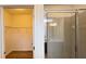 Bathroom featuring a glass-enclosed shower, adjacent closet, and modern fixtures at 6041 Broad Oak Dr, Davenport, FL 33837
