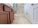 Well-appointed bathroom with a shower-tub combination, complemented by a modern vanity and fixtures at 6041 Broad Oak Dr, Davenport, FL 33837