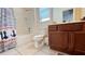Bathroom with a shower-tub combo, modern fixtures, and a functional design at 6041 Broad Oak Dr, Davenport, FL 33837