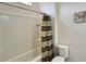 Bright bathroom features a shower-tub combination and clean fixtures for a comfortable and functional space at 6041 Broad Oak Dr, Davenport, FL 33837